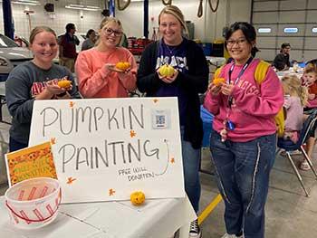Student Activities Council members at Carroll Campus at a fall activity.