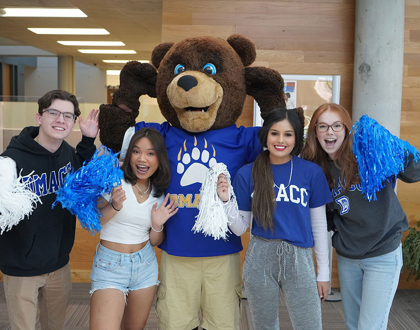 DMACC Students with DMACC Bear