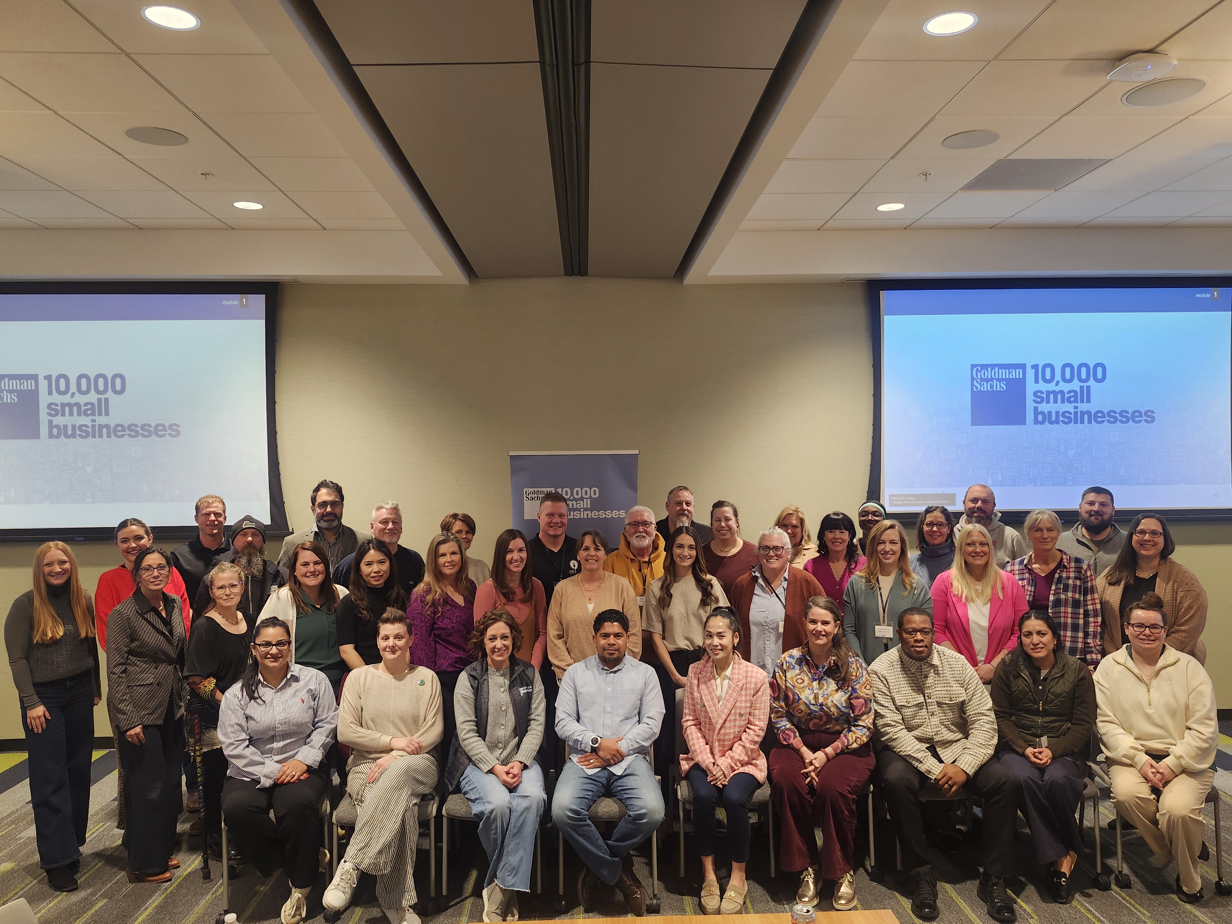 The Goldman Sachs 10,000 Small Businesses in Iowa Cohort 14 pose for a group photo