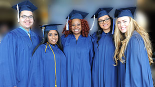 A group of DMACC students at graduation
